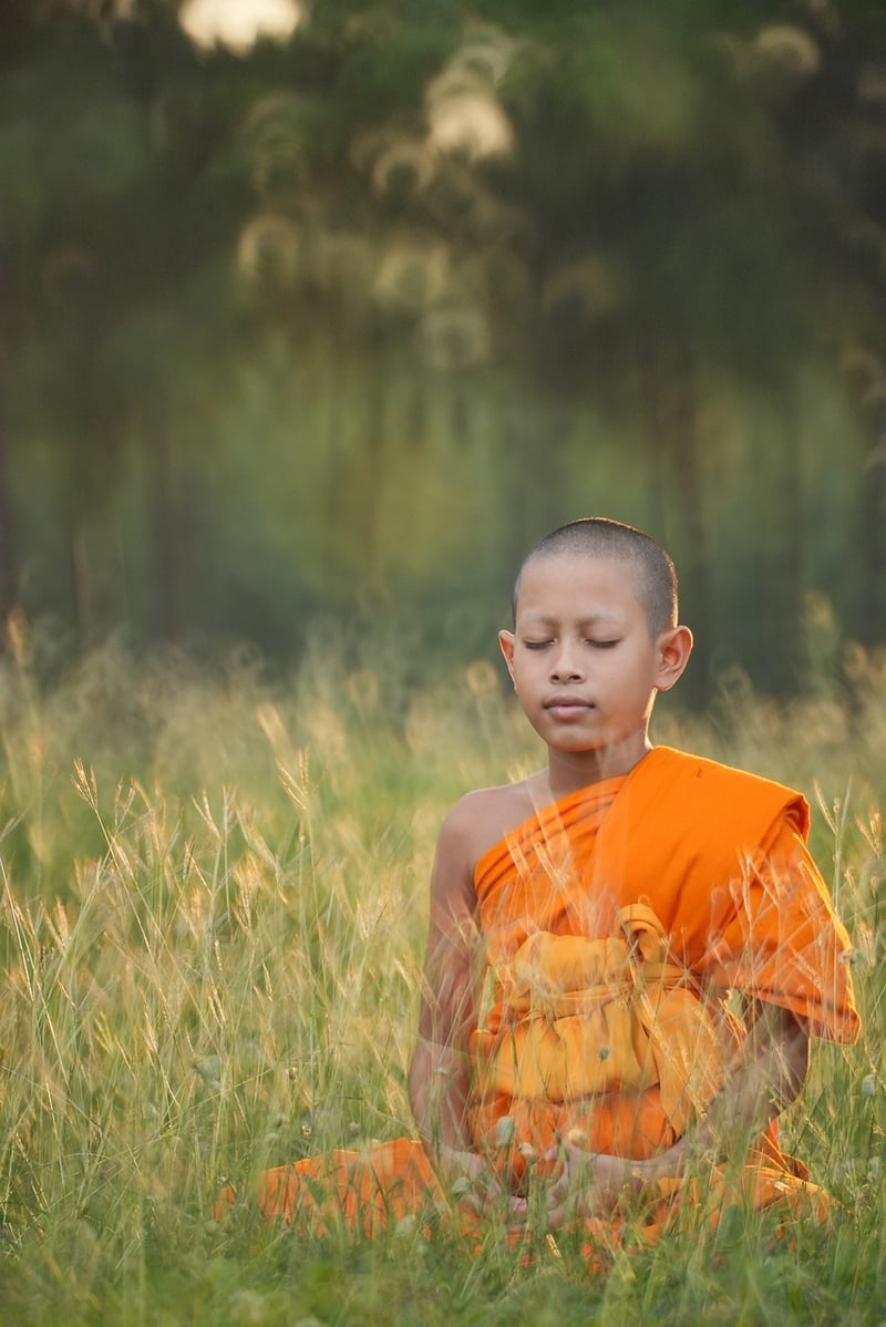 Woman meditating outdoors
